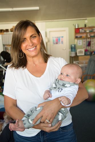 Mother with child in arms